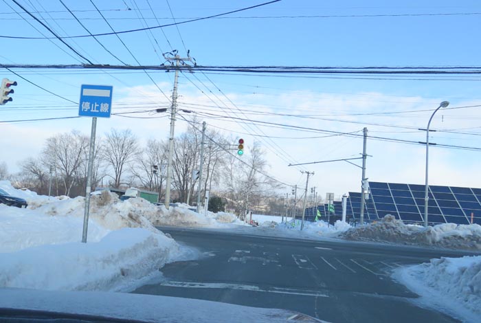 webnews今朝の北見/交差点から奥が無加川の右岸堤防