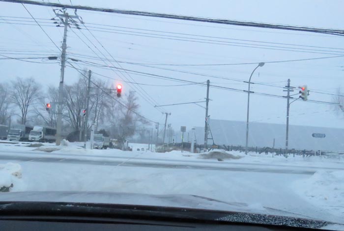webnews今朝の北見/交差点から奥が無加川の右岸堤防